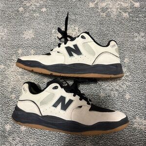 New Balance Cream and Black Sneakers